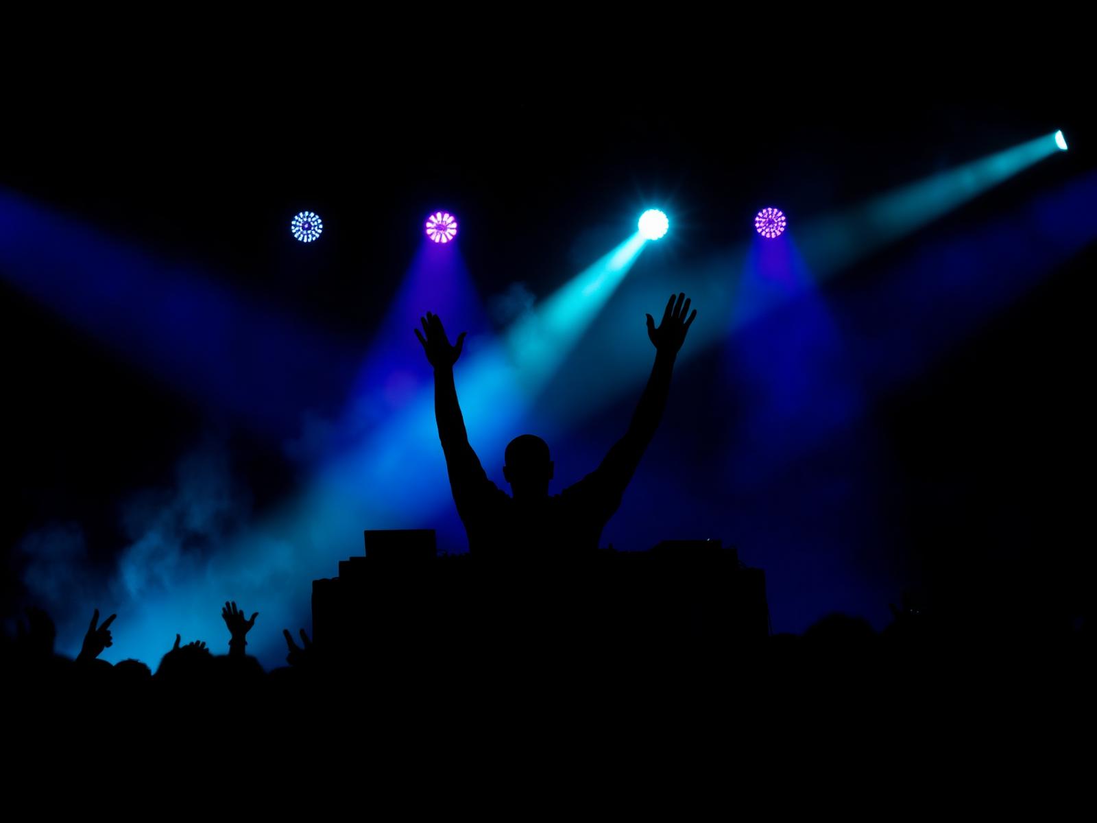 Tuere aka Dj Saint Kairos performing under stage lights